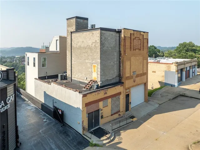 a view of a terrace with seating area