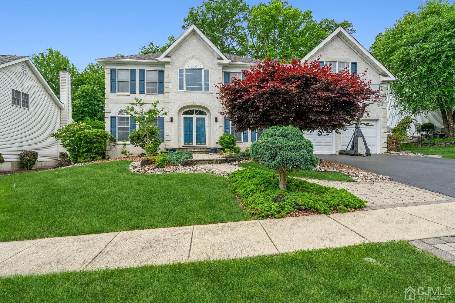 21 Rocky Hill Road Princeton, NJ 08540 - Photo 1 of 52 a front view of a house with a garden and plants