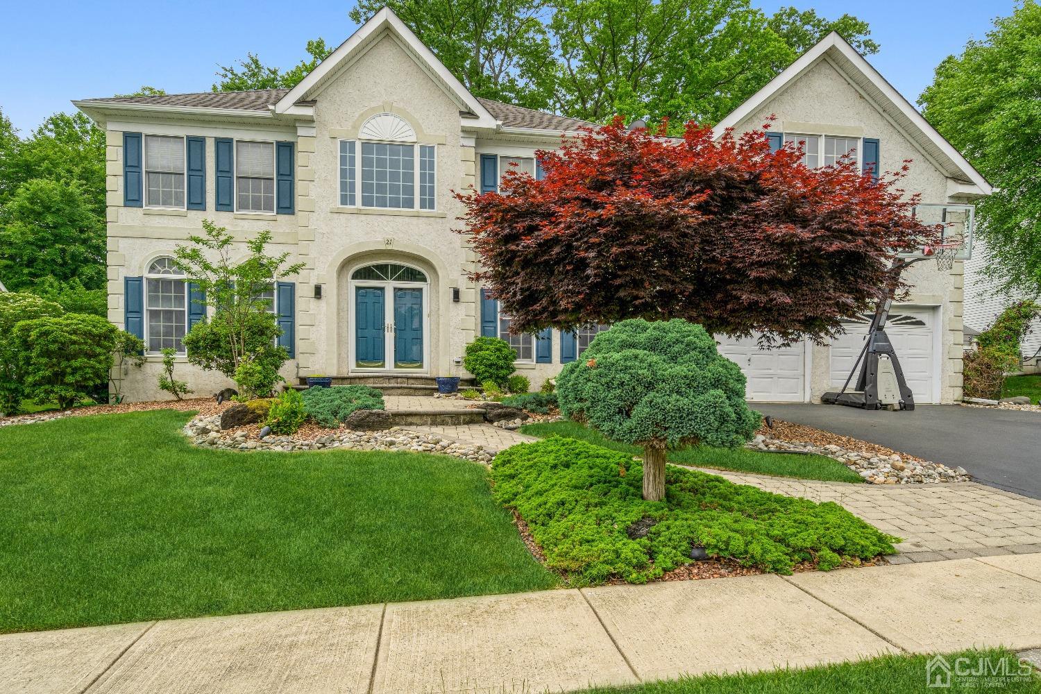 21 Rocky Hill Road Princeton, NJ 08540 - Photo 2 of 52 a front view of a house with a garden