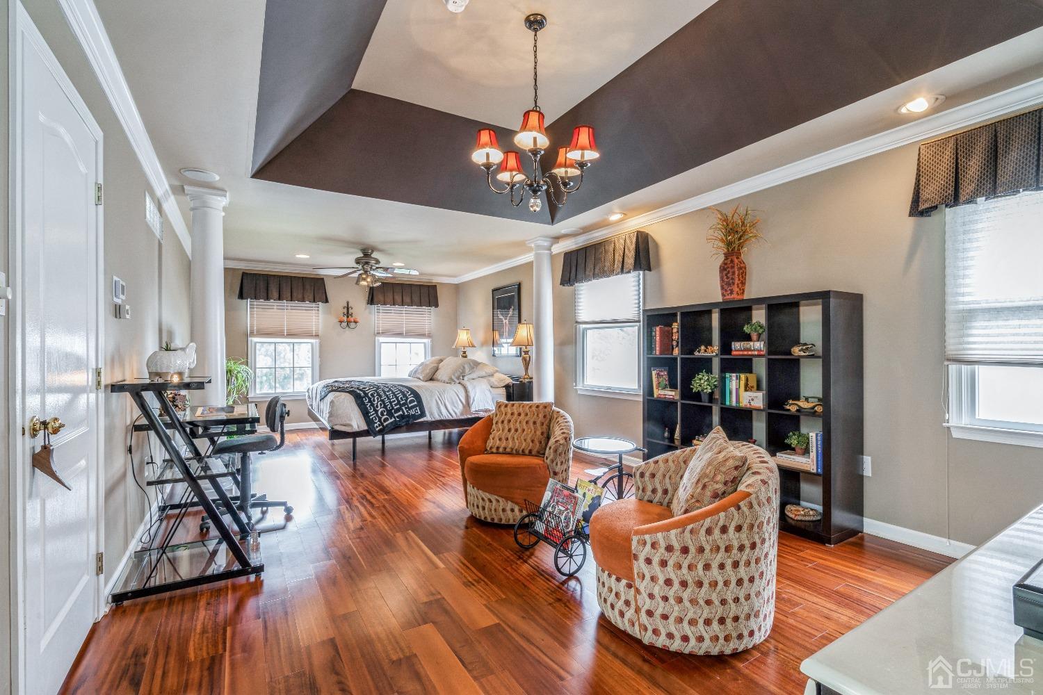 21 Rocky Hill Road Princeton, NJ 08540 - Photo 27 of 52 a living room with furniture a dining table and a chandelier