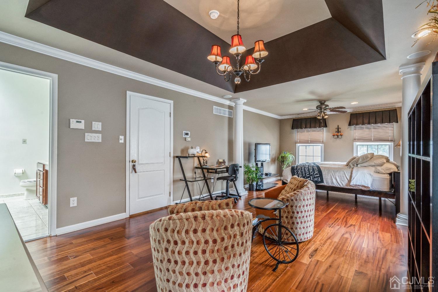 21 Rocky Hill Road Princeton, NJ 08540 - Photo 29 of 52 a living room with furniture and a chandelier