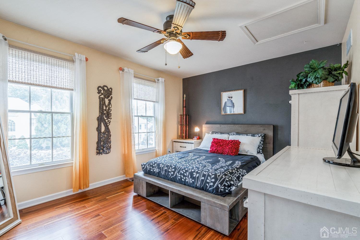21 Rocky Hill Road Princeton, NJ 08540 - Photo 36 of 52 a bedroom with a bed window and a flat screen tv
