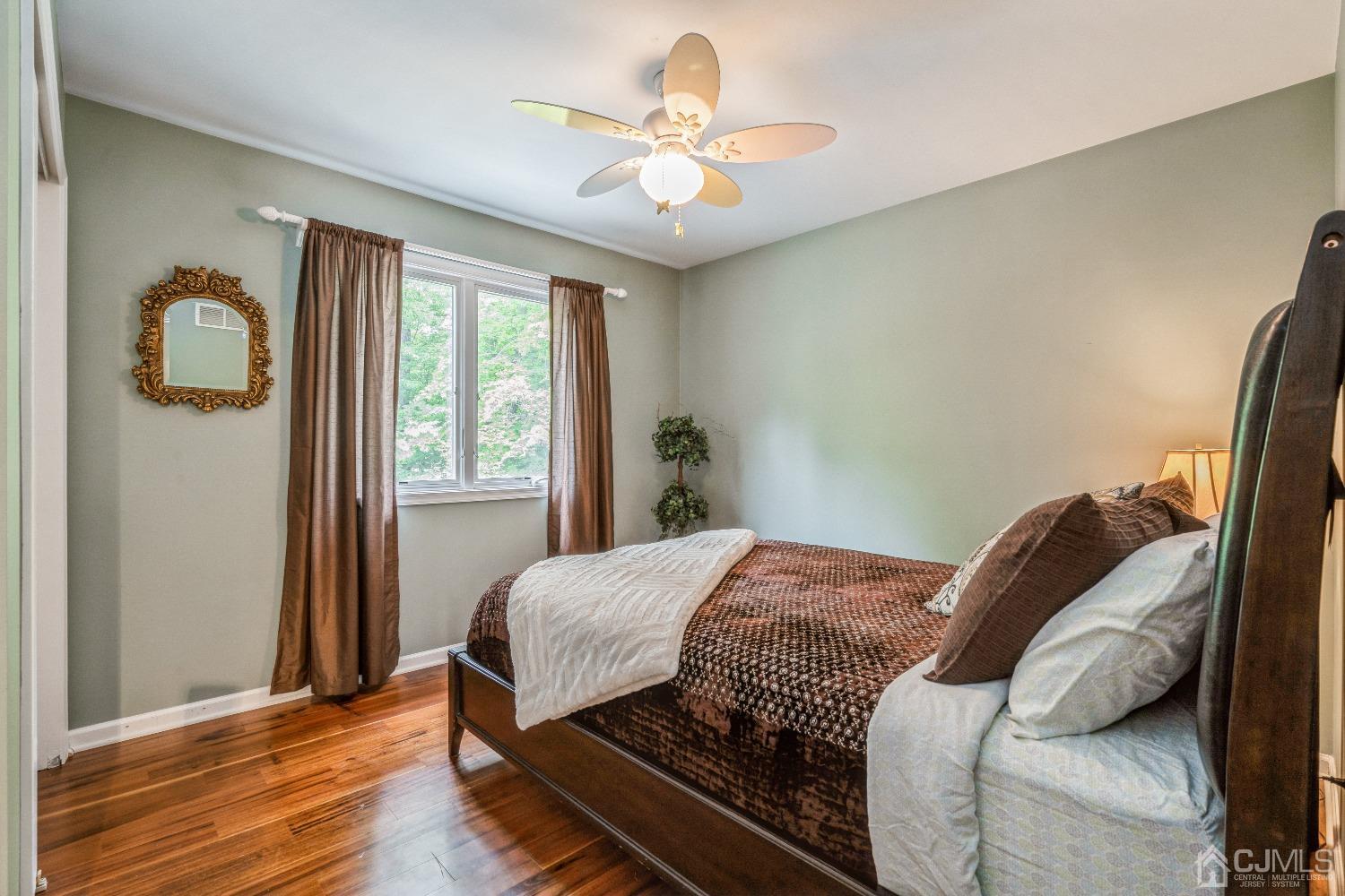 21 Rocky Hill Road Princeton, NJ 08540 - Photo 37 of 52 a bedroom with a bed and a window