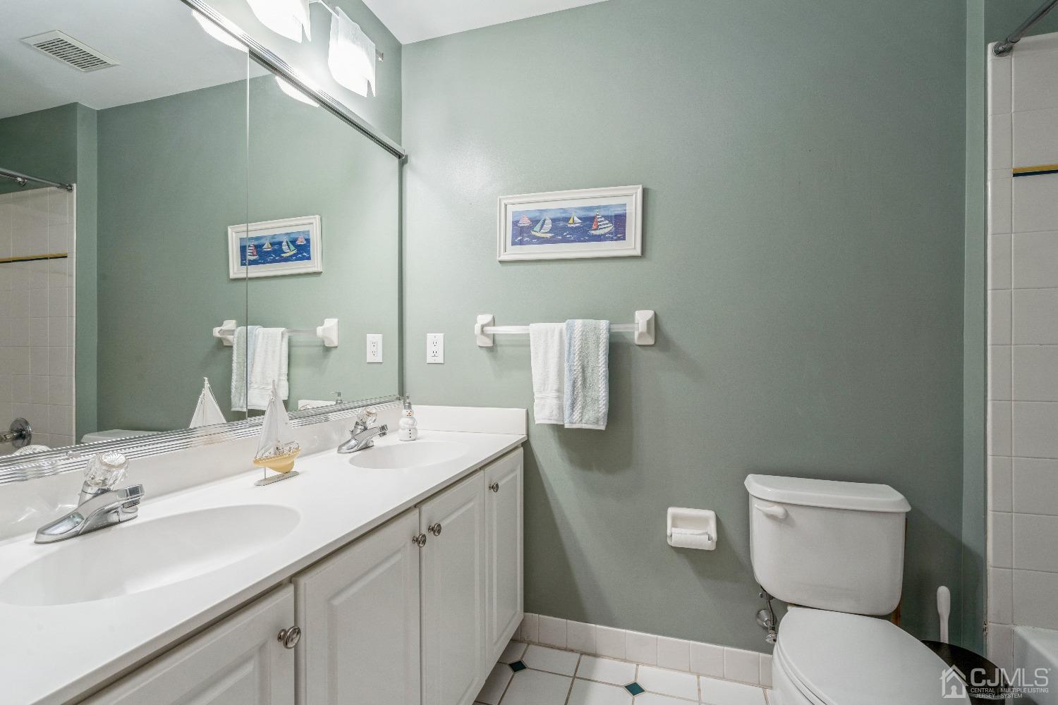 21 Rocky Hill Road Princeton, NJ 08540 - Photo 41 of 52 a bathroom with a toilet sink and mirror