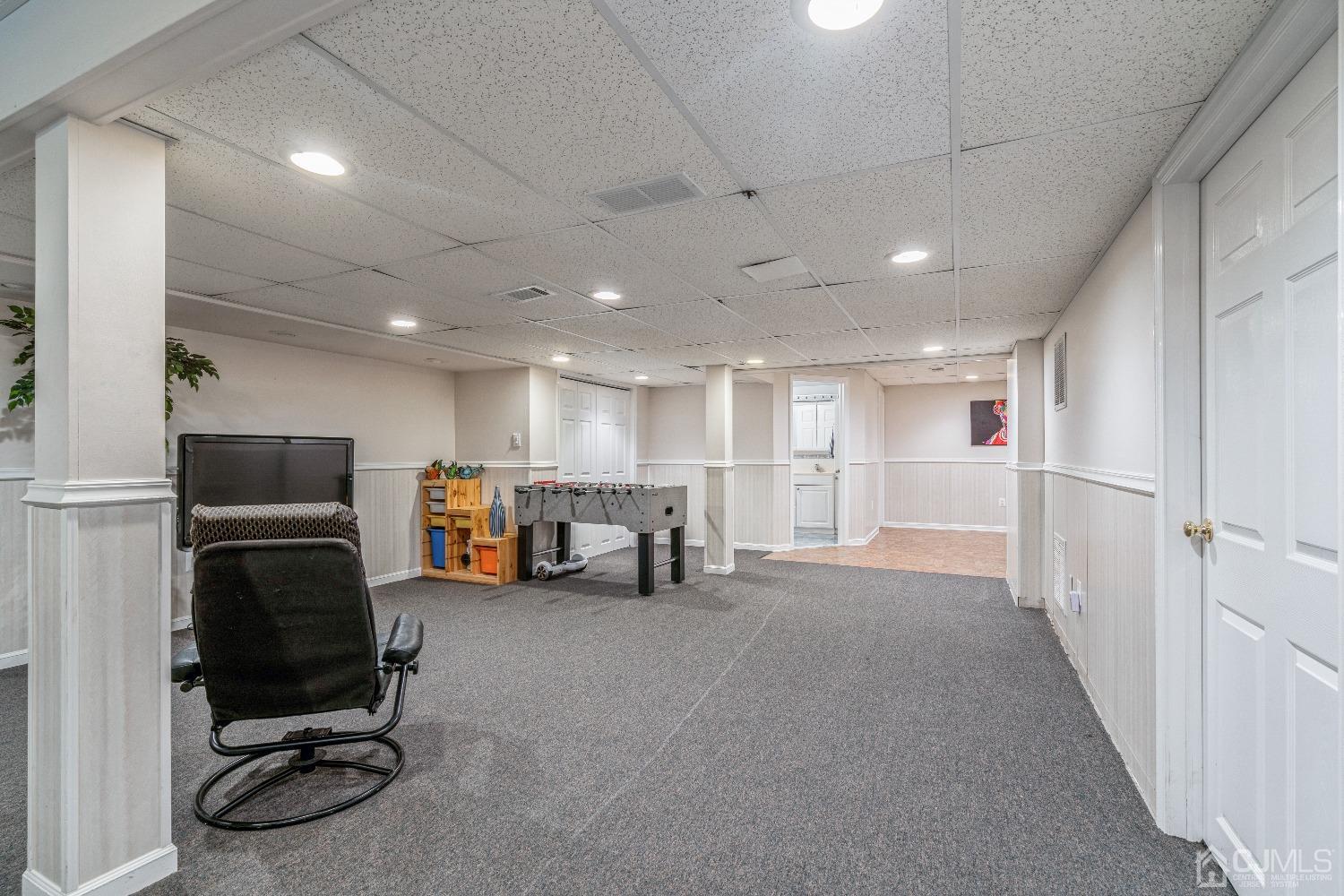 21 Rocky Hill Road Princeton, NJ 08540 - Photo 43 of 52 a view of a room with gym equipment and refrigerator