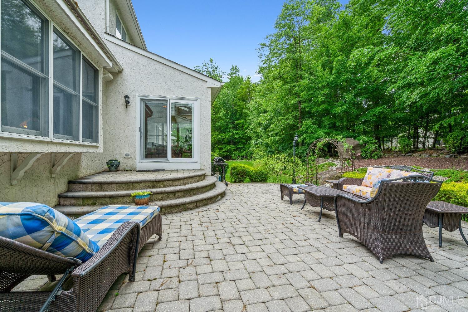 21 Rocky Hill Road Princeton, NJ 08540 - Photo 46 of 52 a view of a patio with table and chairs and potted plants