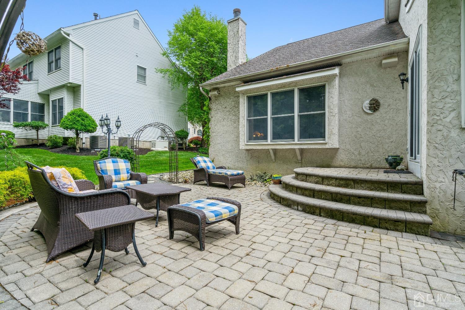 21 Rocky Hill Road Princeton, NJ 08540 - Photo 47 of 52 a backyard of a house with table and chairs
