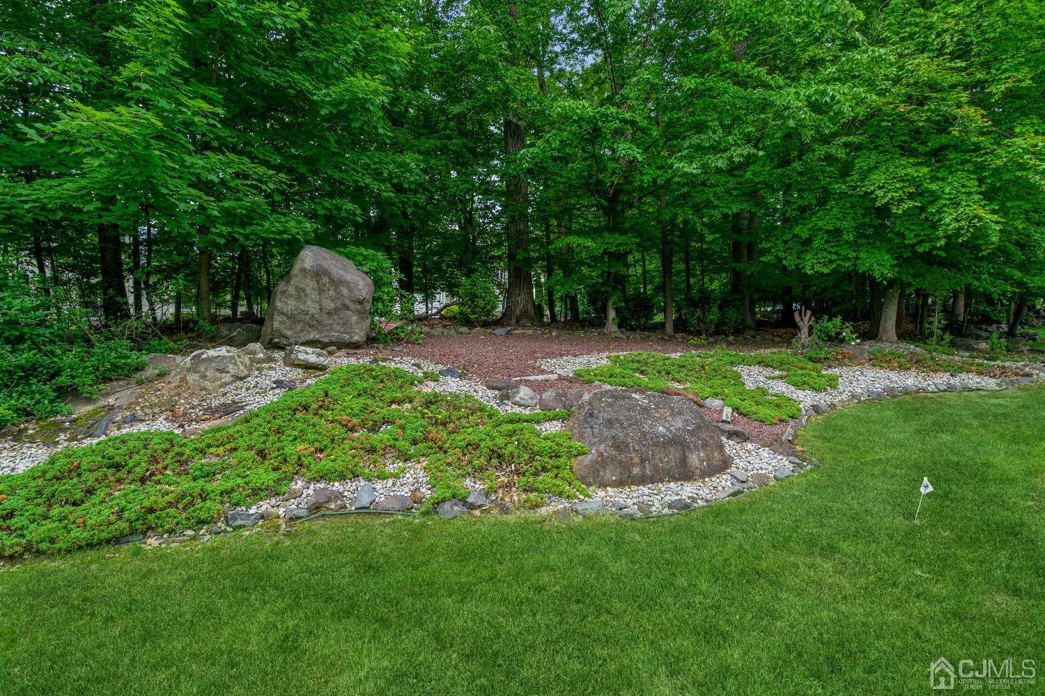 21 Rocky Hill Road Princeton, NJ 08540 - Photo 49 of 52 a backyard of a house with lots of green space