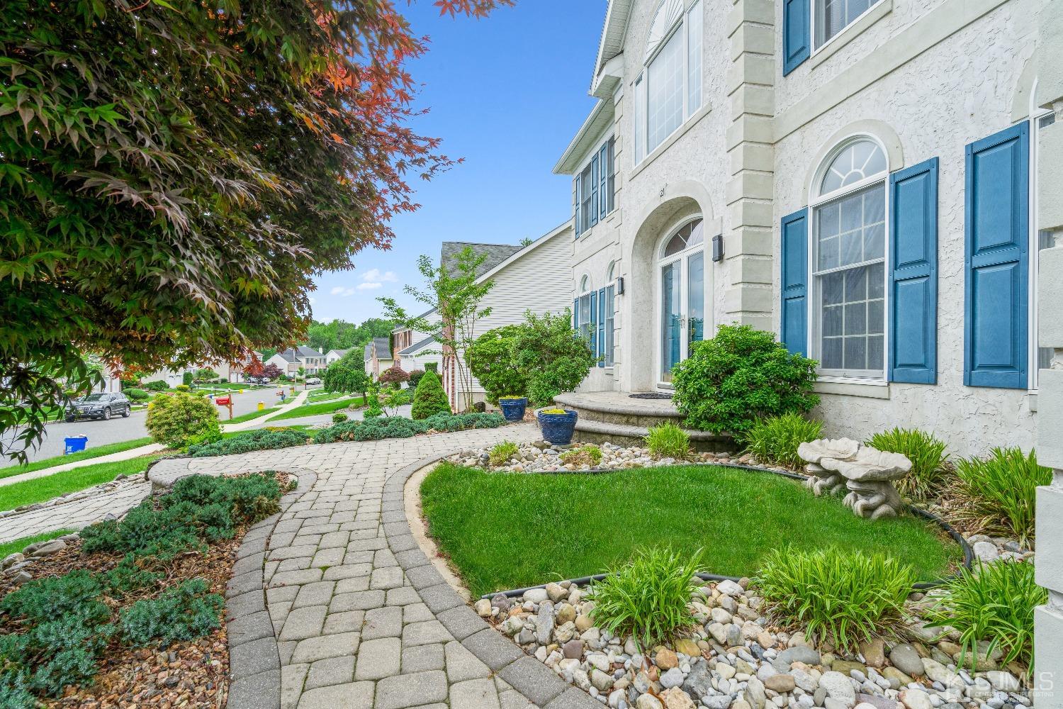 21 Rocky Hill Road Princeton, NJ 08540 - Photo 5 of 52 a front view of a house with garden and plants