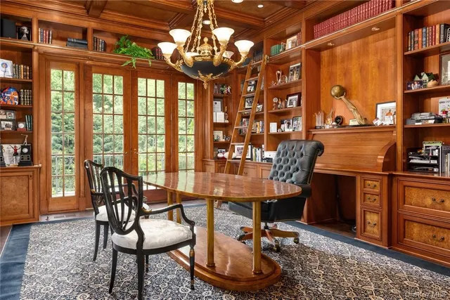 a spacious bedroom with a bed and a window