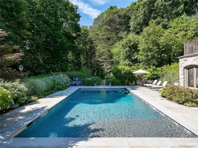 a view of a golf course with a lake