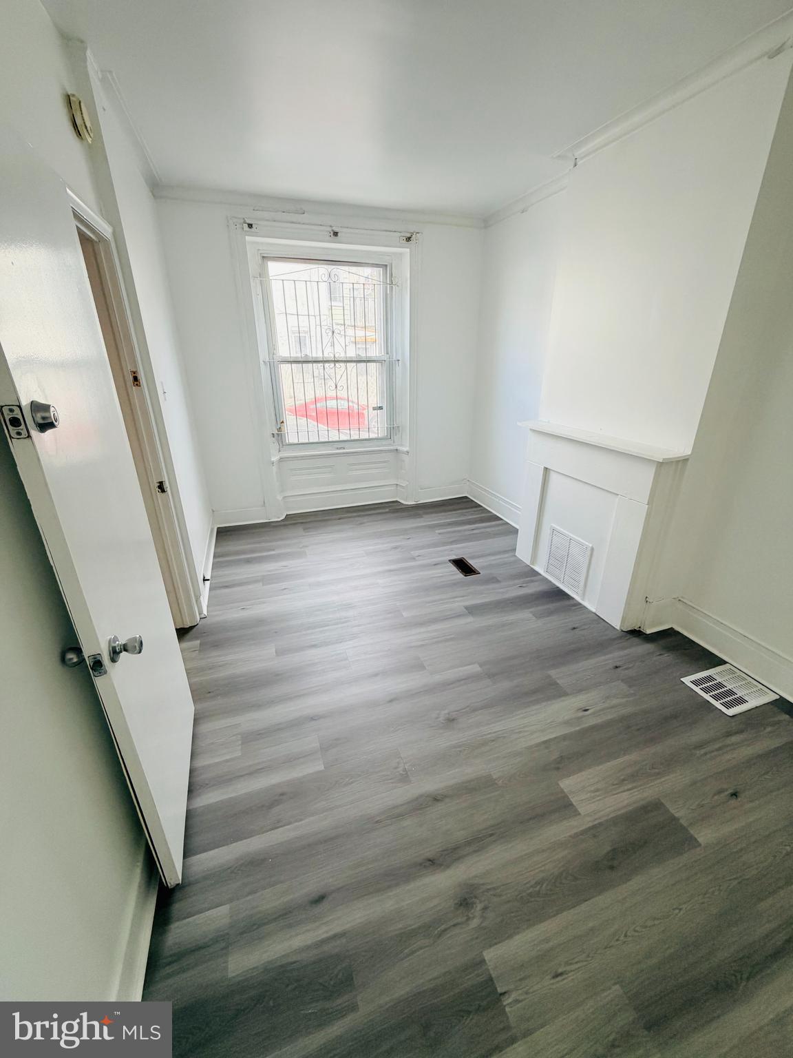 2260 North 15th Street Philadelphia, PA 19132 - Photo 7 of 12 a view of an empty room with a window