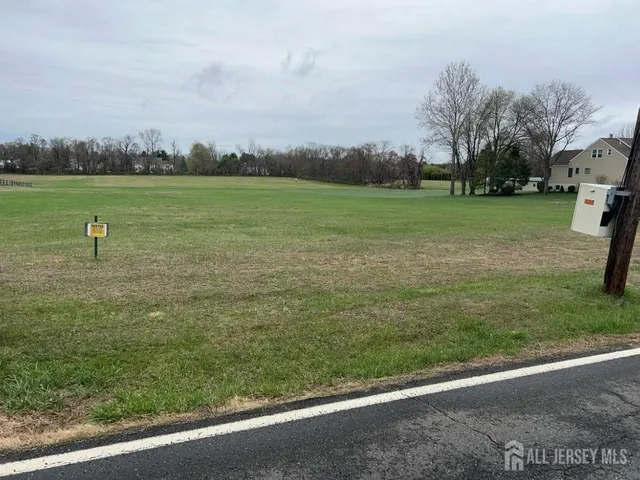 a view of a golf course with a garden