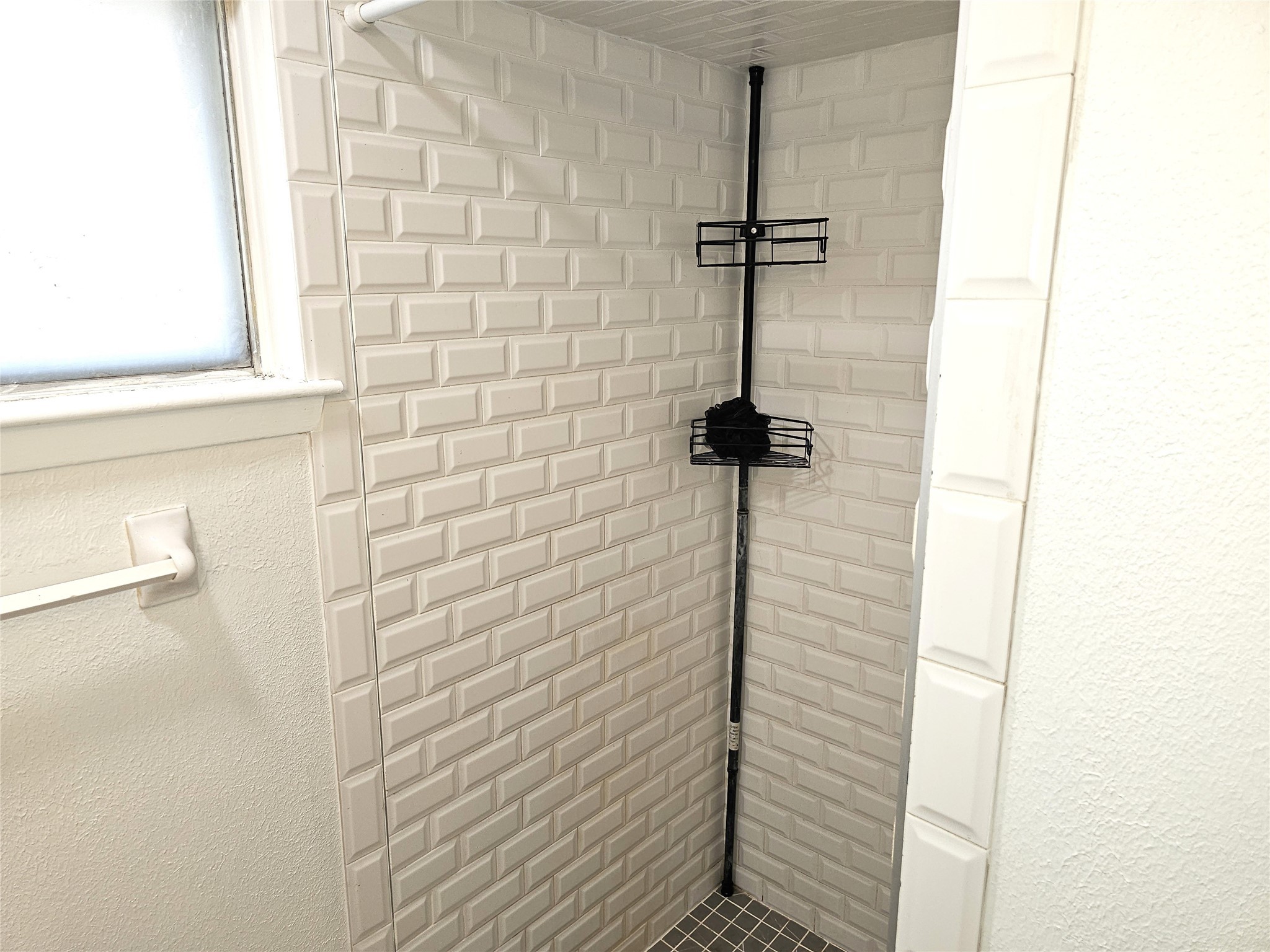 11427 Kirkmeadow Drive Houston, TX 77089 - Photo 18 of 24 a bathroom with a shower