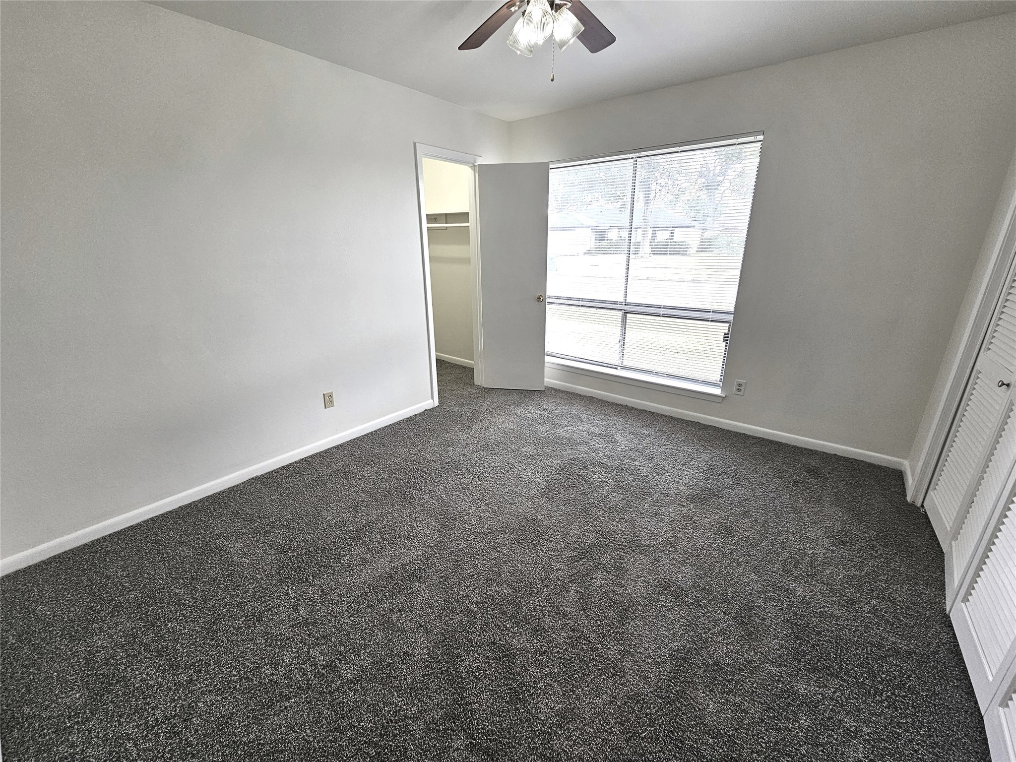 11427 Kirkmeadow Drive Houston, TX 77089 - Photo 22 of 24 an empty room with a window