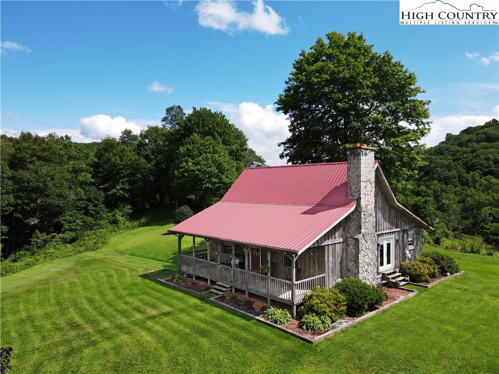 2232 Greer Town Road Lansing, NC 28643 - Photo 1 of 28 a view of a house with a big yard