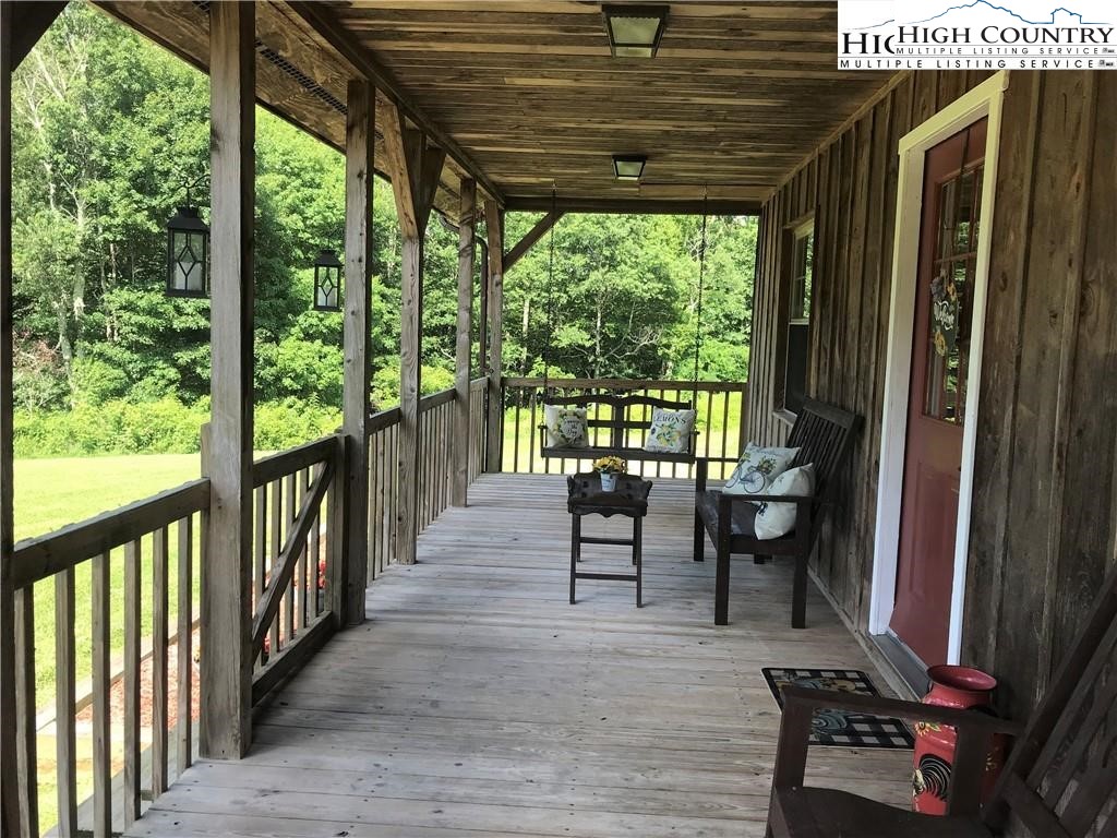 2232 Greer Town Road Lansing, NC 28643 - Photo 21 of 28 a view of two chairs in the balcony