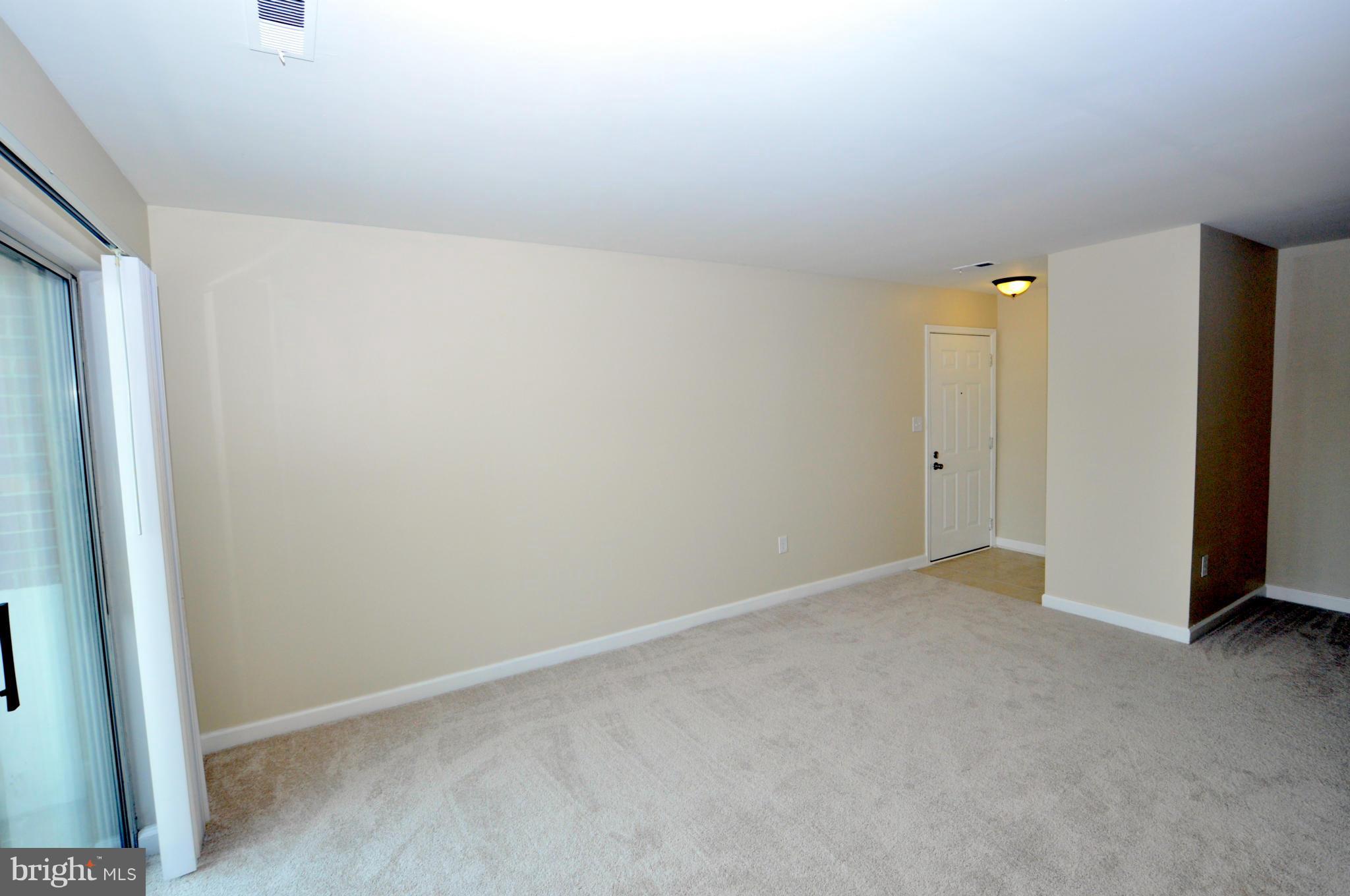 6710 Ridge Road, Unit 104 Baltimore, MD 21237 - Photo 5 of 12 Living Room