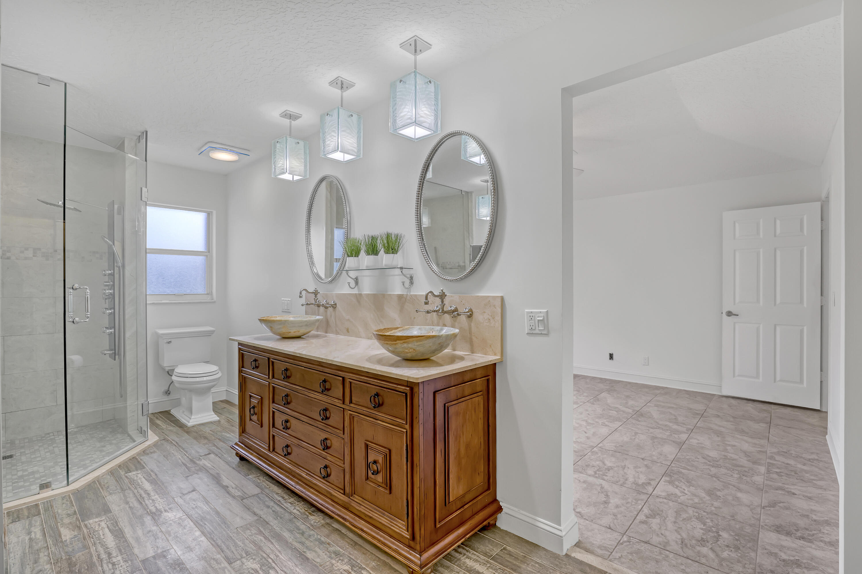 3035 Casa Rio Court Riviera Beach, FL 33418 - Photo 13 of 28 Primary Bathroom