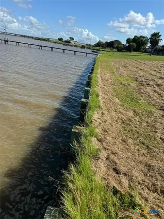 a view of a lake with outdoor space