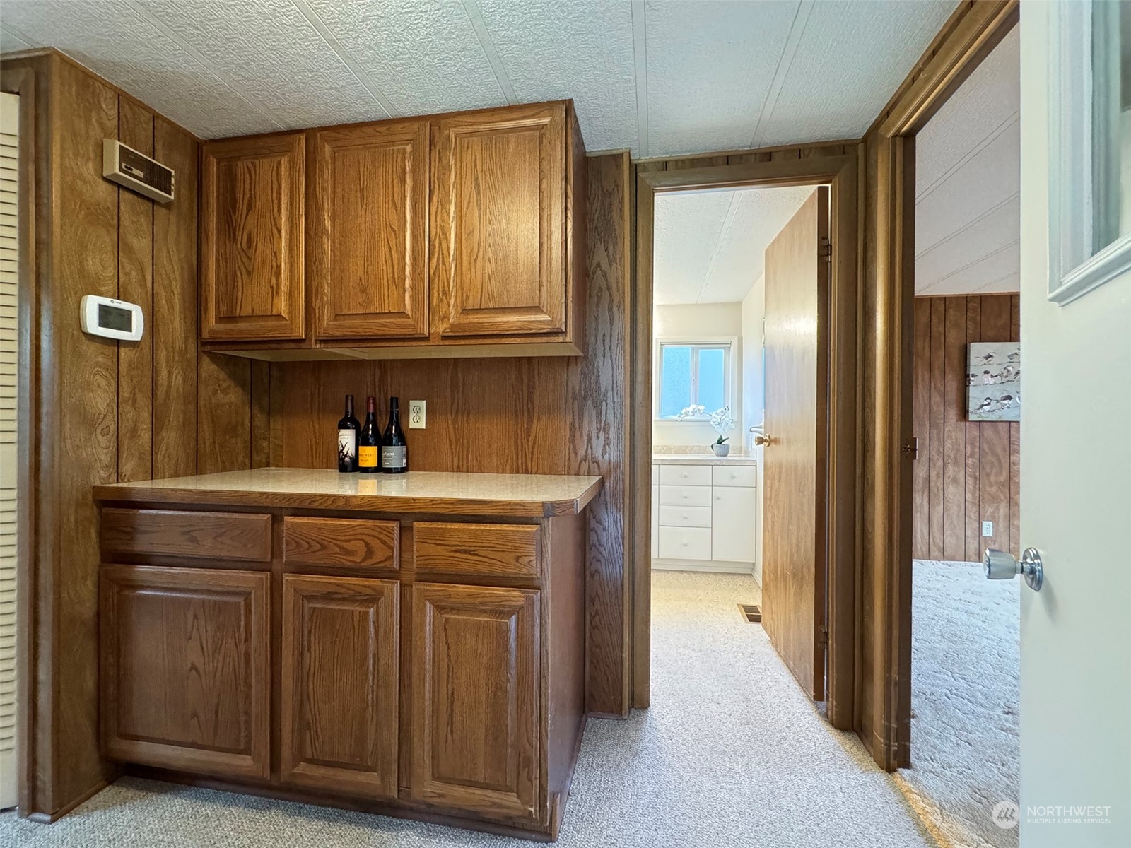 241 Evans Road Sequim, WA 98382 - Photo 20 of 40 a kitchen with granite countertop stainless steel appliances and cabinets