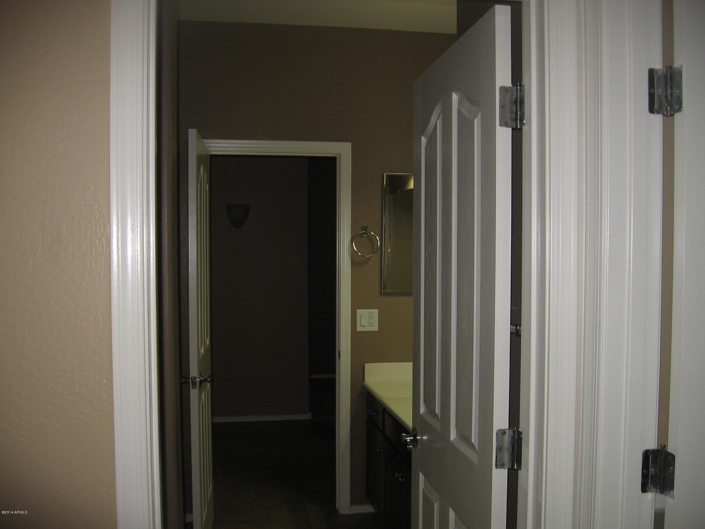 18022 West Hatcher Road Waddell, AZ 85355 - Photo 28 of 38 a bathroom with a shower