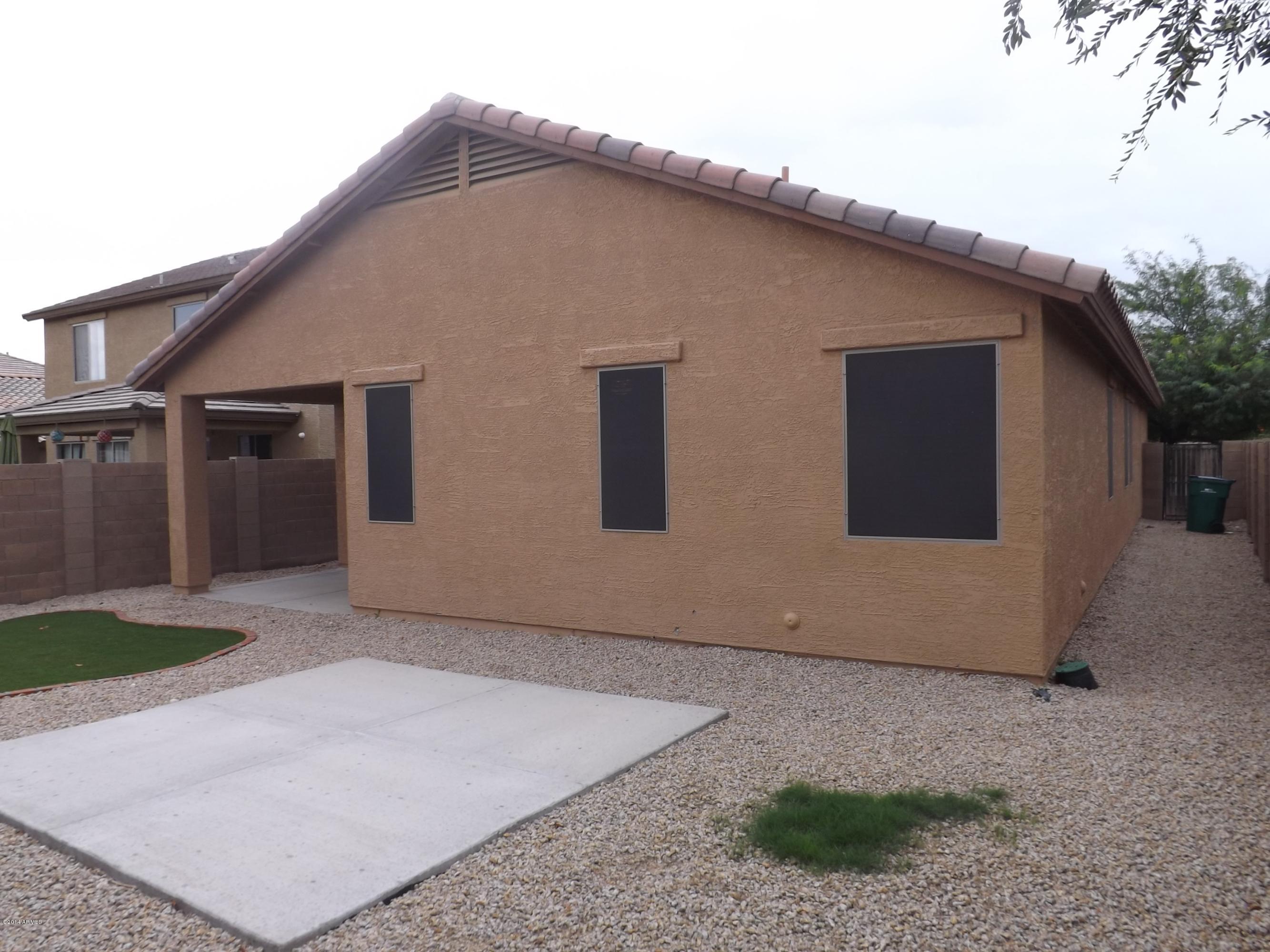 18022 West Hatcher Road Waddell, AZ 85355 - Photo 34 of 38 a house view with a outdoor space