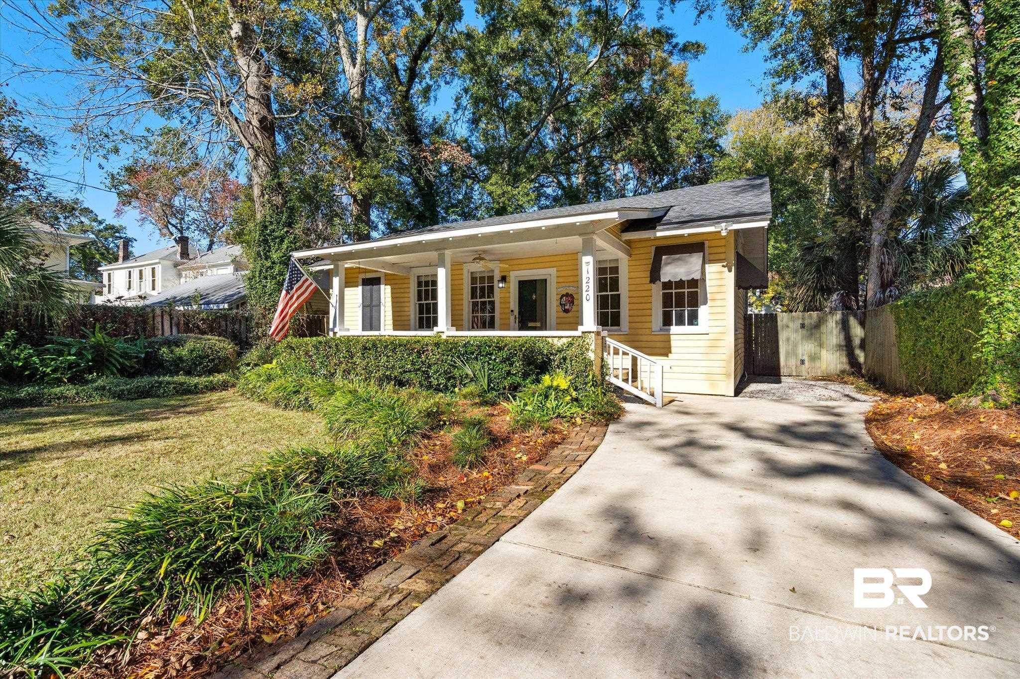1220 Elmira Street Mobile, AL 36604 - Photo 1 of 20 View of front facade with a front yard