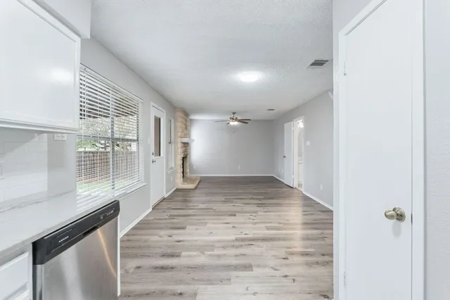a view of an empty room and window
