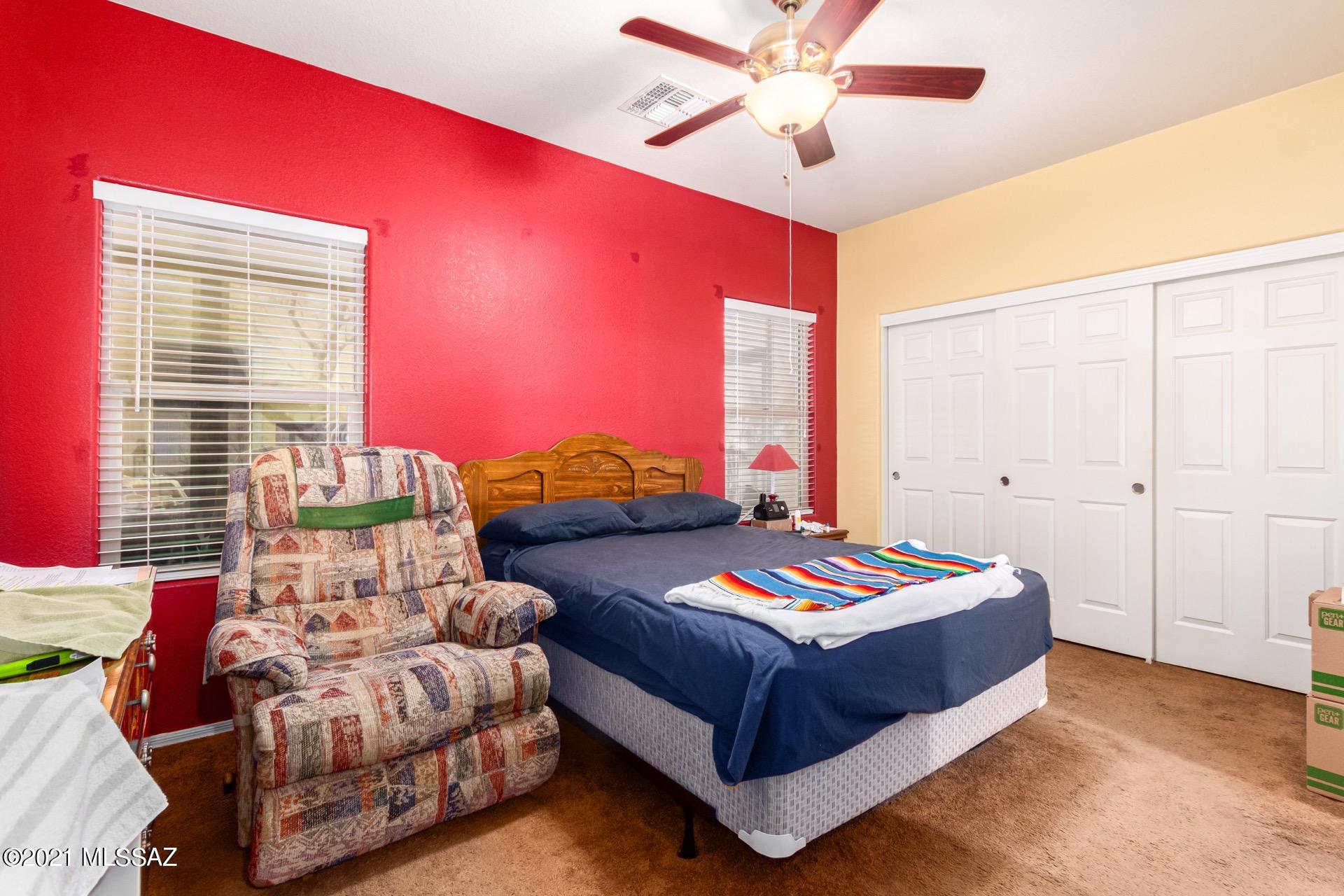 20894 East Founders Road Red Rock, AZ 85145 - Photo 14 of 27 a bedroom with a bed and window