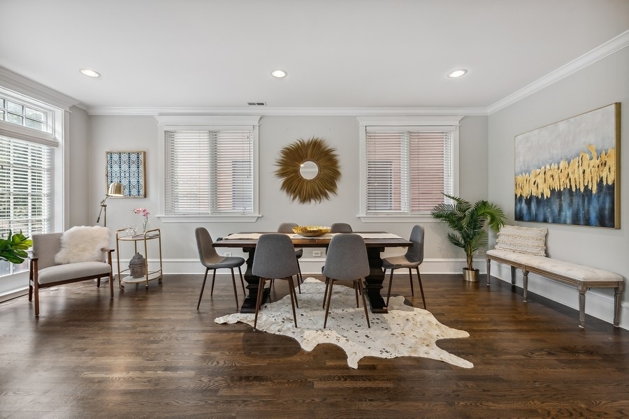 1359 North Mohawk Street, Unit 2 Chicago, IL 60610 - Photo 11 of 23 a view of a dining room with furniture window and wooden floor