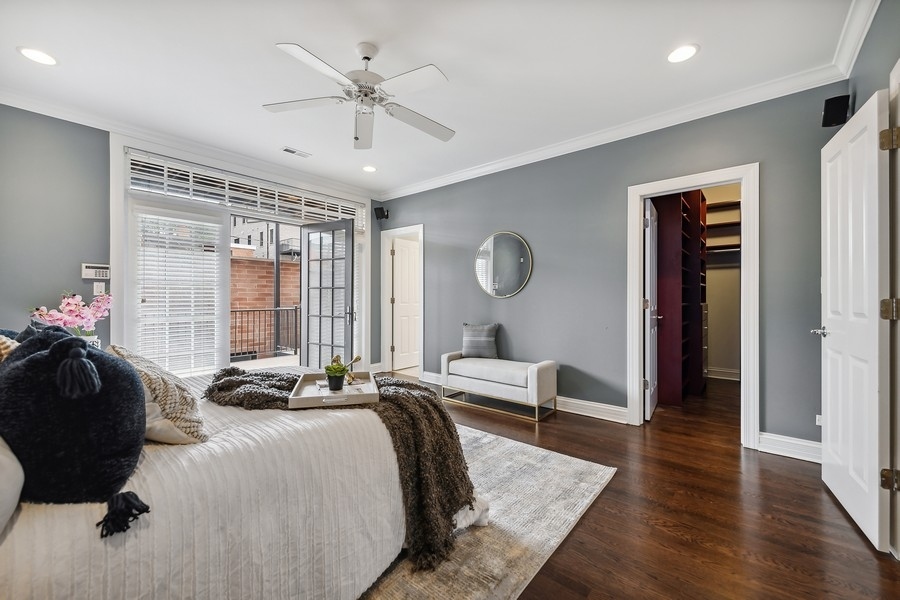 1359 North Mohawk Street, Unit 2 Chicago, IL 60610 - Photo 13 of 23 a bedroom with a bed and a large window