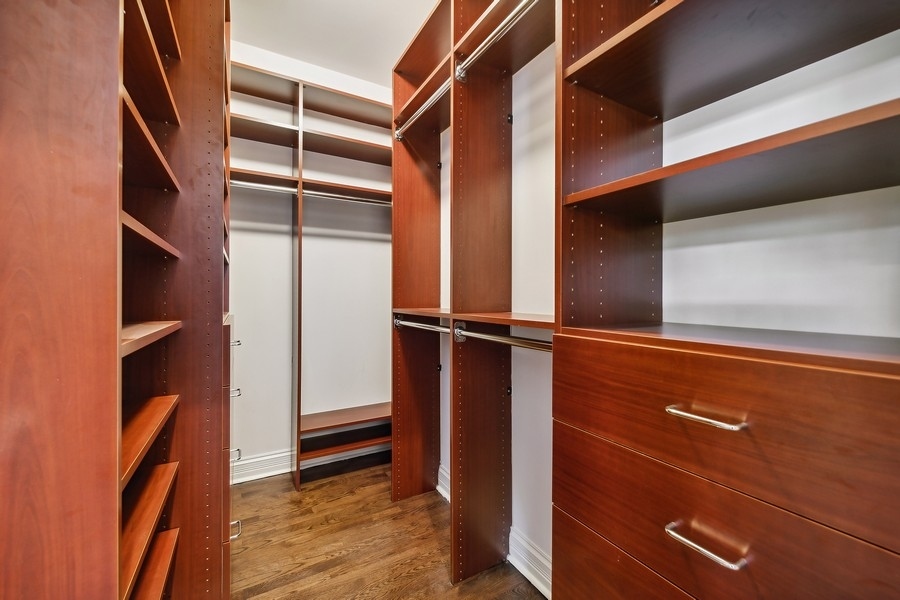 1359 North Mohawk Street, Unit 2 Chicago, IL 60610 - Photo 15 of 23 a view of walk in closet with empty racks
