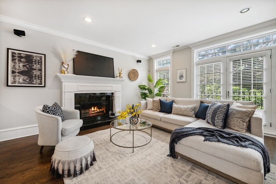 1359 North Mohawk Street, Unit 2 Chicago, IL 60610 - Photo 3 of 23 a living room with furniture and a fireplace