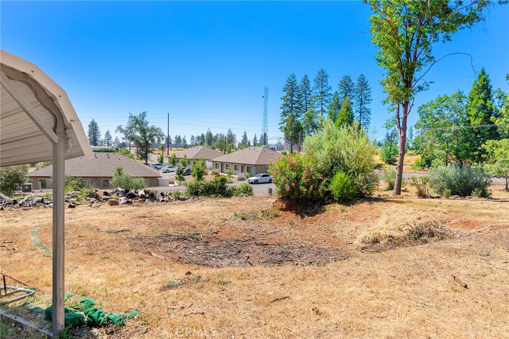 880 Elliott Road Paradise, CA 95969 - Photo 18 of 19 a view of a backyard of a house