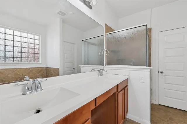 a stove top oven sitting inside of a kitchen