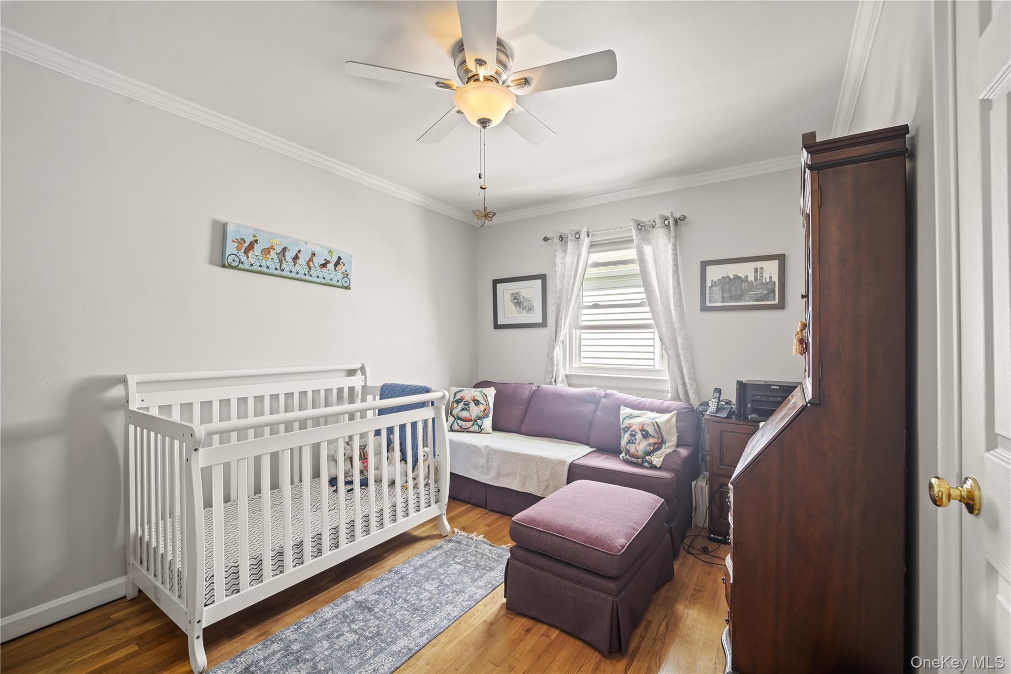 98 Hawkins Street Bronx, NY 10464 - Photo 12 of 26 a bedroom with furniture and a window