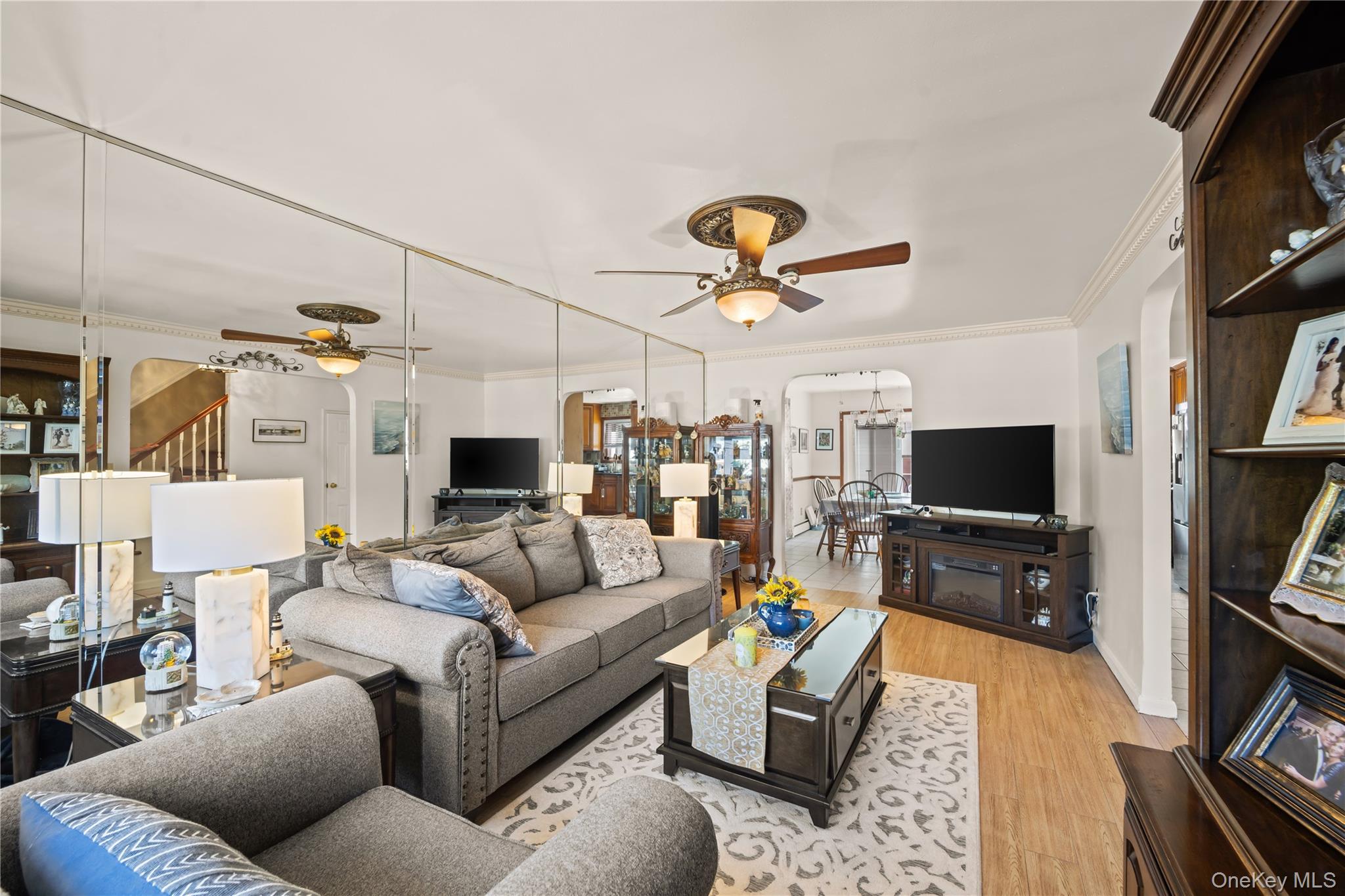 98 Hawkins Street Bronx, NY 10464 - Photo 5 of 26 a living room with furniture and a flat screen tv