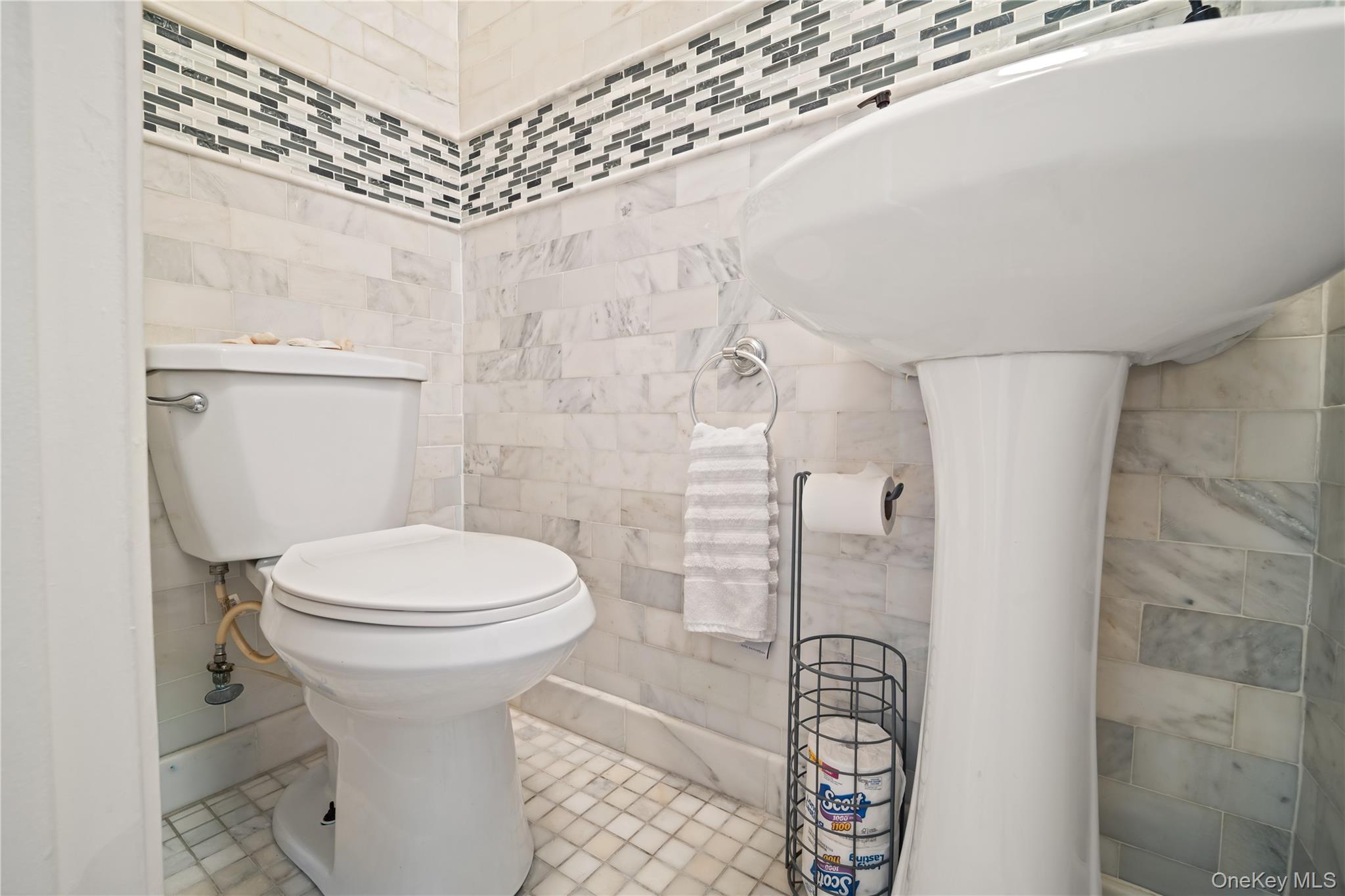 98 Hawkins Street Bronx, NY 10464 - Photo 6 of 26 a bathroom with a toilet and a shower