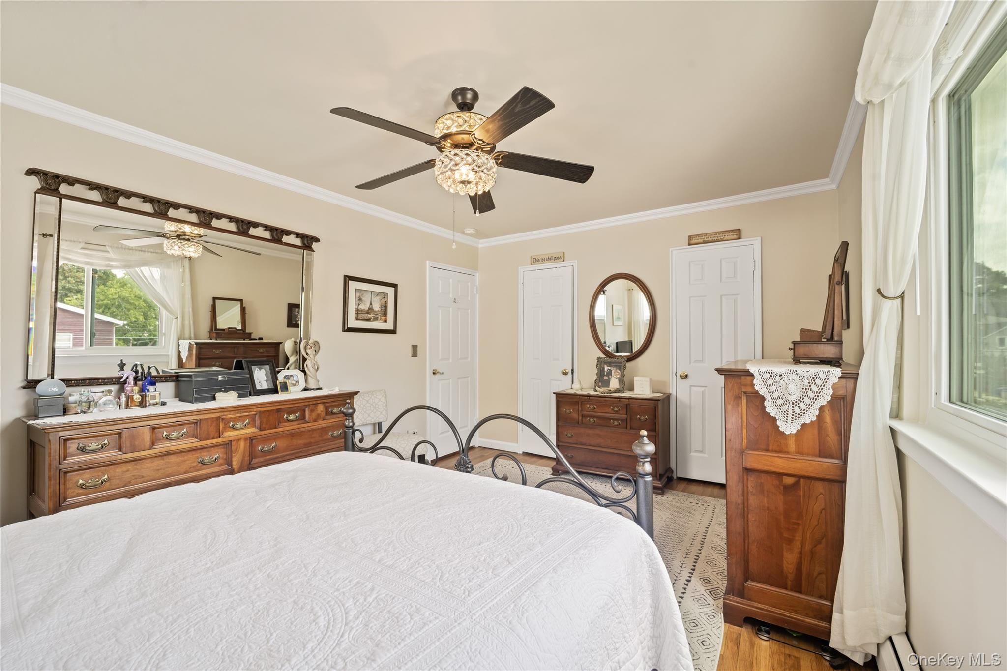 98 Hawkins Street Bronx, NY 10464 - Photo 9 of 26 a bedroom with bed and wooden floor