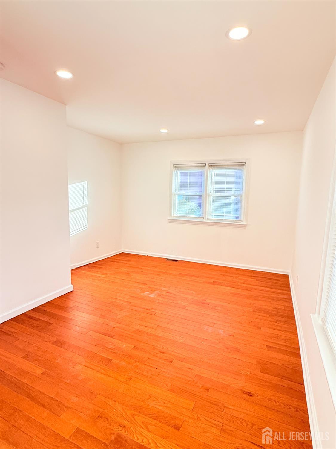 385 Pierson Avenue, Unit 1 Edison, NJ 08837 - Photo 9 of 17 a view of an empty room