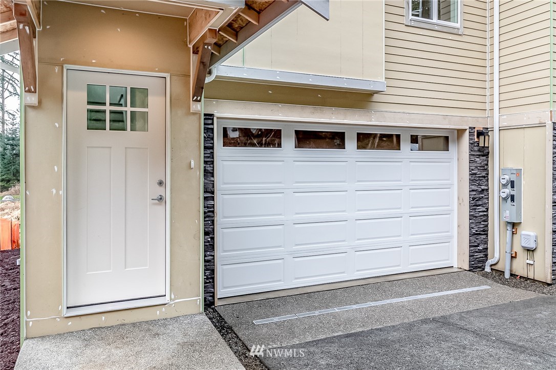 2720 Callow Road, Unit A Lake Stevens, WA 98258 - Photo 2 of 32 a front view of a house with a parking space