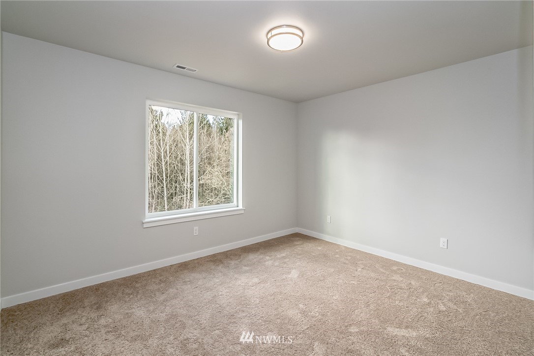 2720 Callow Road, Unit A Lake Stevens, WA 98258 - Photo 19 of 32 an empty room with a window