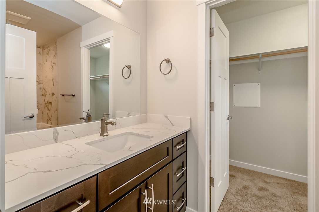 2720 Callow Road, Unit A Lake Stevens, WA 98258 - Photo 22 of 32 a bathroom with a sink and a mirror