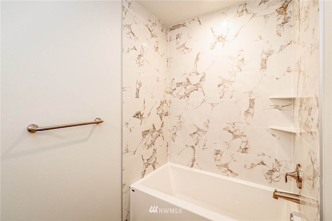 2720 Callow Road, Unit A Lake Stevens, WA 98258 - Photo 24 of 32 a bathroom with a bathtub and shower
