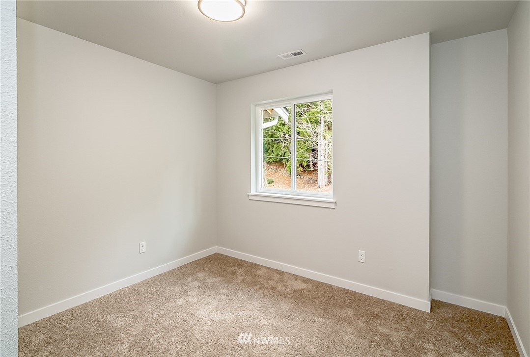 2720 Callow Road, Unit A Lake Stevens, WA 98258 - Photo 27 of 32 an empty room with a window