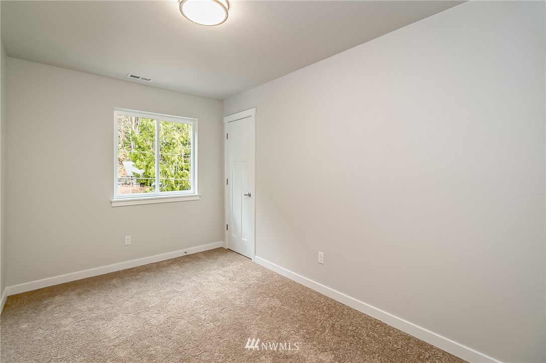 2720 Callow Road, Unit A Lake Stevens, WA 98258 - Photo 29 of 32 an empty room with windows