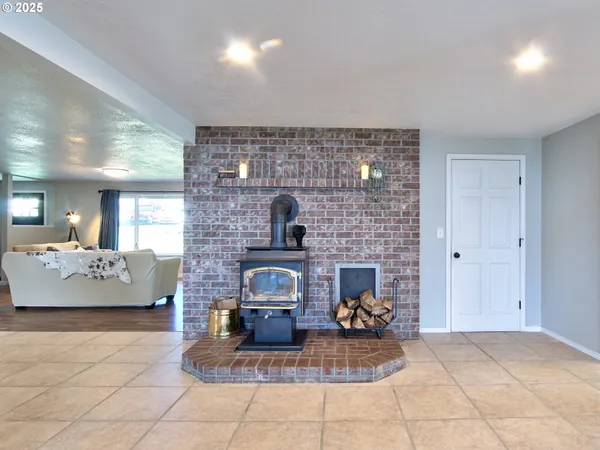 a living room with couches and a fireplace