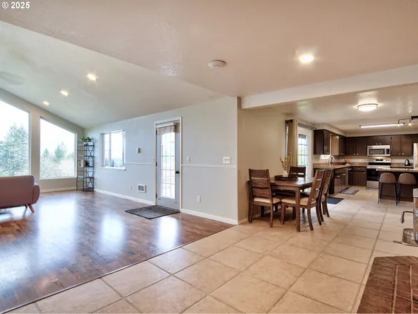 a view of a living room and dining room