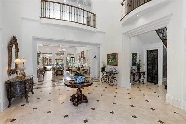 a view of a hallway with dining room